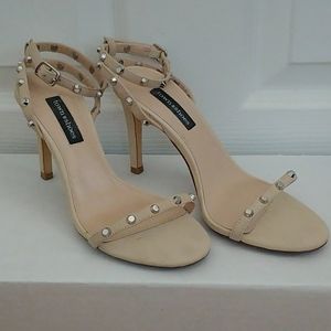 Beige ankle wrap around sandals with metal studs